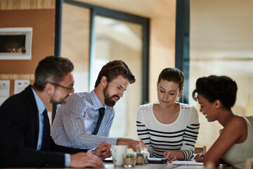 Meeting, brainstorming and business people with tablet, collaboration and project planning for ideas. Discussion, diversity and team director for creative, b2b and workshop for partnership in office