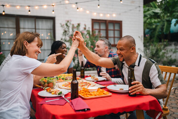 Celebrate the New Year or Christmas with Family and Friends, Joyful Party Filled with Cheer, Delicious Food and Drinks, Creating Happy Memories Together During Holiday Season of Friendship and Fun