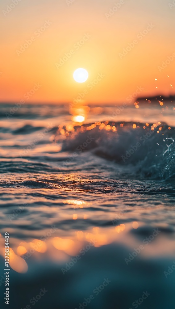 Poster close-up view of ocean waves at sunset with golden hues reflecting on the surface creating a tranqui