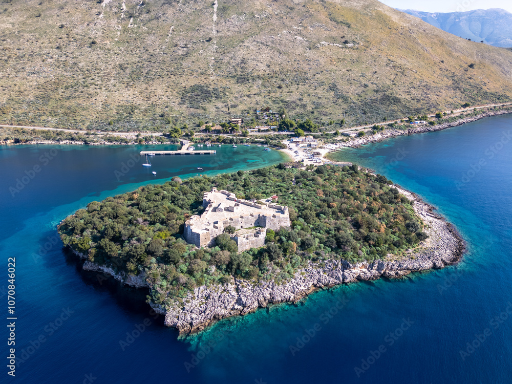 Wall mural Aerial drone photo of the Porto Palermo castle at the coast in Albania.