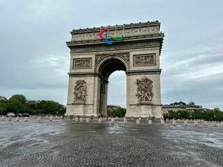 Iconic Arc de Triomphe in Paris on a cloudy day