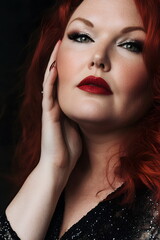 Fototapeta premium portrait of a woman with red hair
