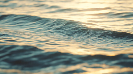 calm ocean water surface with sunset light