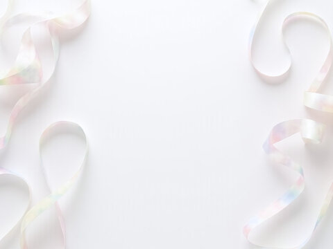 Background featuring holographic ribbons set against a white backdrop created as a 3D rendering in soft pastel colors