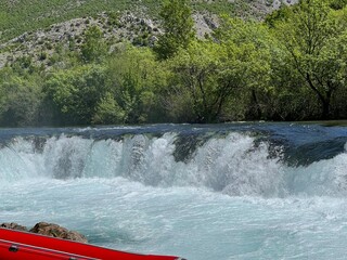 Fototapeta premium Ogar's waterfall or Ogarov buk waterfall on the Zrmanja river, Muskovci (Velebit Nature Park, Croatia) - Slap Ogarov buk ili Ogarov slap na rijeci Zrmanji, Muškovci (Park prirode Velebit, Hrvatska)