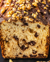 Fototapeta premium Sliced cozonac loaf with chocolate and nut marbling
