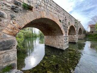 Historic stone bridge on the river Zrmanja, Kastel Zegarski (Velebit Nature Park, Croatia) - Povijesni kameni most na rijeci Zrmanji, Ka&scaron;tel Žegarski (Park prirode Velebit, Hrvatska)