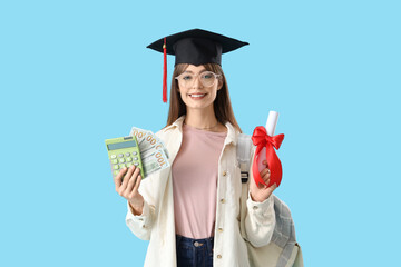 Female student in graduation hat with money, calculator and diploma on blue background. Education...