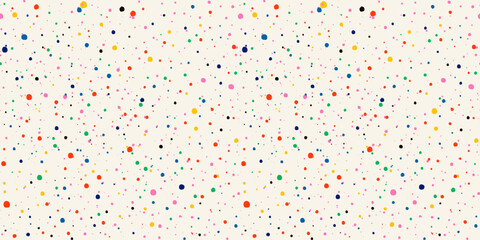 Seamless polka dot pattern with confetti dots on a light background. Carnival backdrop for birthdays. Abstract rainbow splatter. Ink splash for print templates, textiles, and festive wrapping paper.