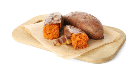 Tasty cooked sweet potatoes and wooden board isolated on white