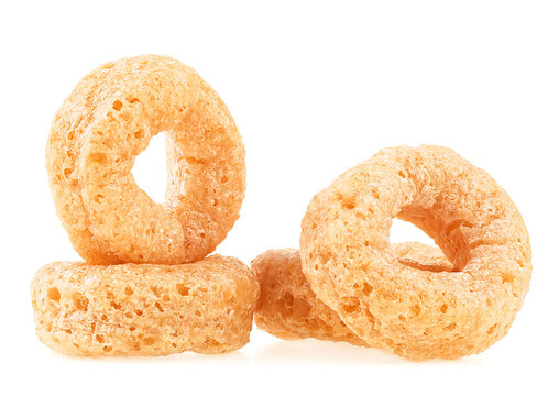 Healthy cereal corn rings isolated on a white background. Crunchy puffed snacks.