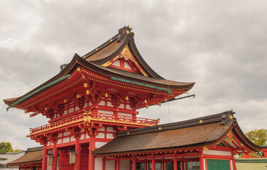 Fototapeta premium Fushimi Inari Taisha - Kyoto’s Iconic Shrine of Thousand Torii Gates. Taken in Japan, Kyoto, 04.2024.