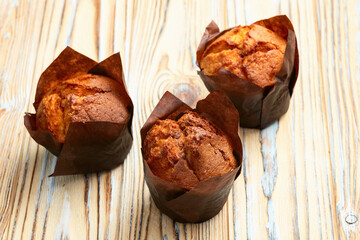 Sweet Baked vanilla muffins ( cupcake )  . Top view