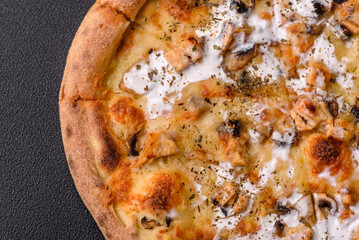 Creamy pizza with truffle cheese, mozzarella, chicken and mushrooms