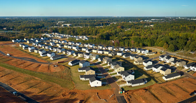 Ground prepared for building of new residential houses in South Carolina suburban development area. Concept of growing american suburbs
