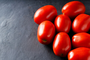 Homegrown Red Tomatoes on Dark Surface, Farm-to-Table Vegetables, Copy Space