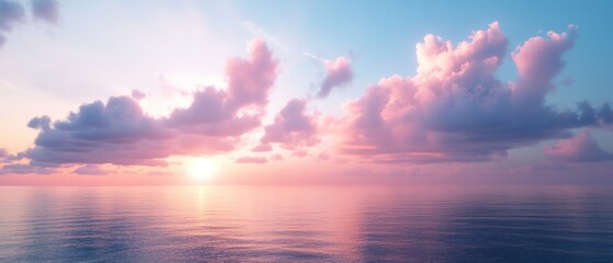 Fototapeta premium A serene sunset over calm waters, with soft pastel clouds reflecting the light.