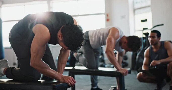 Men, coach and dumbbell with motivation at gym with workout, goal or high five for muscle growth. Personal trainer, people and together with bodybuilder for training, exercise or tablet for wellness