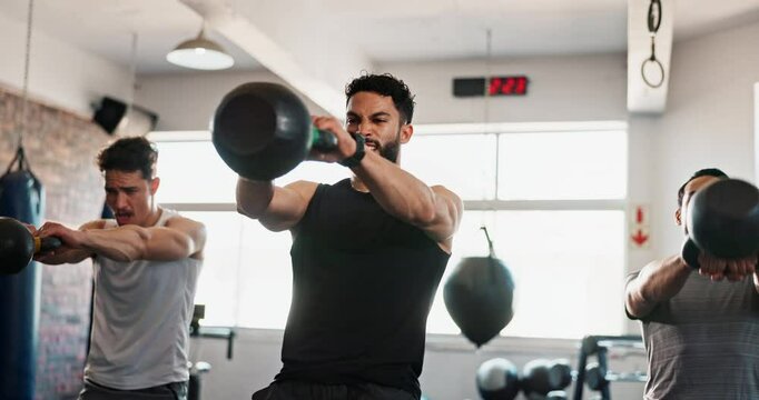 Coach, men and squat with kettlebell at gym with power, training or together for muscle development. Personal trainer, people and bodybuilder with weightlifting, exercise and workout at wellness club