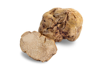 Whole Alba white truffle next to a cut one isolated 