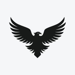 an eagle logo with a black bird