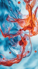 Obraz premium Dynamic swirls of vivid orange and blue ink in water highlighting fluidity and motion in abstract art concept with isolated color droplets