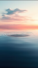 Obraz premium Tranquil ocean surface with rippling water and pastel sky at dusk, serene coastal atmosphere, soft clouds above reflecting in calm sea