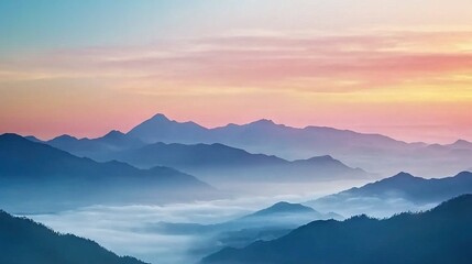 Fototapeta premium A mountain range viewed from afar with a pink and blue sky in the background and clouds in the foreground