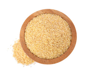 Raw wheat groats in bowl isolated on white, top view