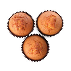 Three delicious sweet muffins isolated on white, top view