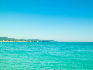 Obraz premium Blue water of Tyrrhenian sea in Vada, Tuscany, Italy.