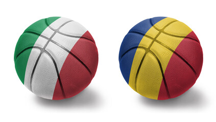 basketball balls with the national flags of romania and italy on the white background.