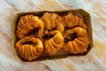 Appetizing fresh crispy croissant served for dessert