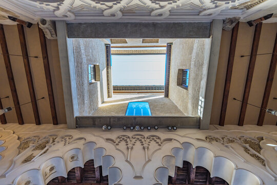 Zaragoza, Spain - July 23, 2024 : Palacio de la Aljaferia Palace. Mixtilinear arches and springers Fortified medieval palace, now House of Aragon regional parliament