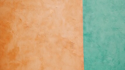 Fototapeta premium An orange-green wall with a black-white cat on top