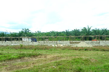 unfinished architectural buildings made of concrete and wood
