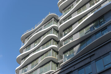 Fototapeta premium skyward exterior view of Artistry Condos by Tribute Communities located at 292 Dundas Street West in Toronto, Canada