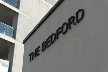 Fototapeta premium exterior sign of The Bedford By Burnac, site of a future condominium complex, located at 287 Davenport Road in Toronto, Canada