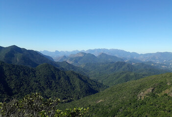 Naklejka premium Rio de Janeiro, Brazil, September 15, 2024. View of the Tinguá biological reserve, from the Boné hill, in the mountainous region of the state of Rio de Janeiro.