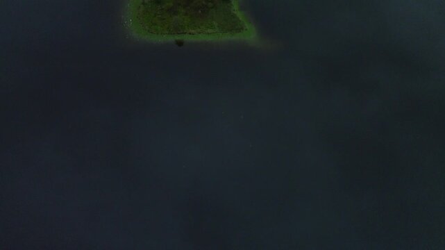 Beautiful drone clip of Loch Leven, Scotland, early in the morning, with a nice fog trapped in the valley.