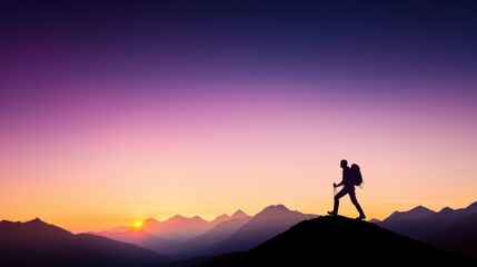 Fototapeta premium A lone hiker silhouetted against the dramatic silhouette of a mountain range as the sun rises behind it, casting long shadows across the valley below and illuminating the sky with warm colors.