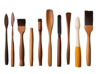 Wooden sculpting tools arranged on black background, isolated on a white background, transparent background.