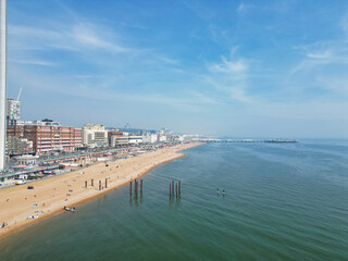 Aerial View of British Tourist Attraction of Beach and Ocean at Brighton and Hove Coastal City of England United Kingdom. High angle Footage of British Tourist Attraction Was Captured on May 9th, 2024