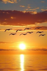 Obraz premium Tranquil Sunset Sky Flock of Birds Silhouetted in Flight Over a Golden Ocean at Sunset