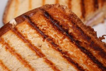 slice of bread. close up of a slice of bread. close up of a piece of food.