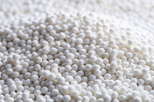 Close-up shot of white plastic polymer granule