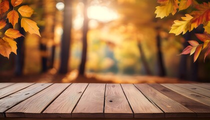 Autumn background with an empty rustic wooden table top and fall leaves in the forest 