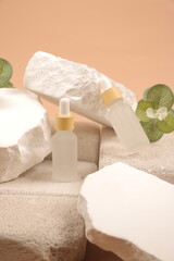 Minimalist Natural Skincare Serum Bottles on White Stone Background