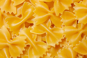 Uncooked Farfalle Pasta: A Culinary Canvas of Bow-Tie Macaroni, Creating a Lively and Textured...
