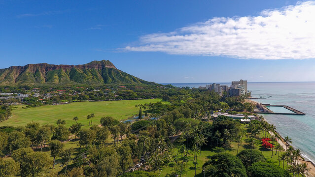 Aerial view of Kapiolani Park, Diamond Head, and Waikiki Natatorium War Memorial at the edge of Waikiki in Honolulu on Oahu, Hawaii